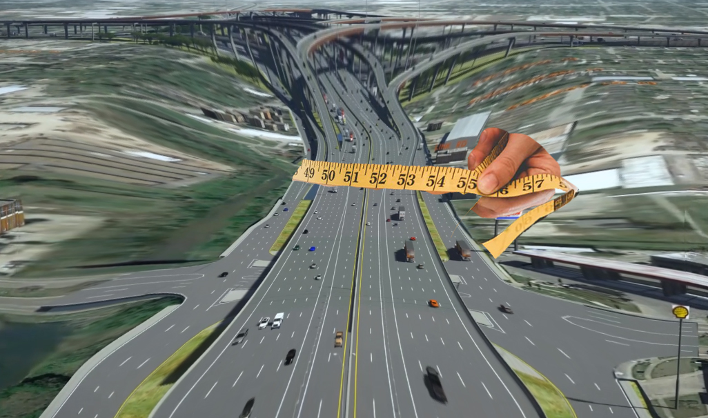 picture of hand using cloth measuring tape to squeeze 10-lane highway